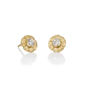 White diamond stud earrings with a wreath of textured gold around it.